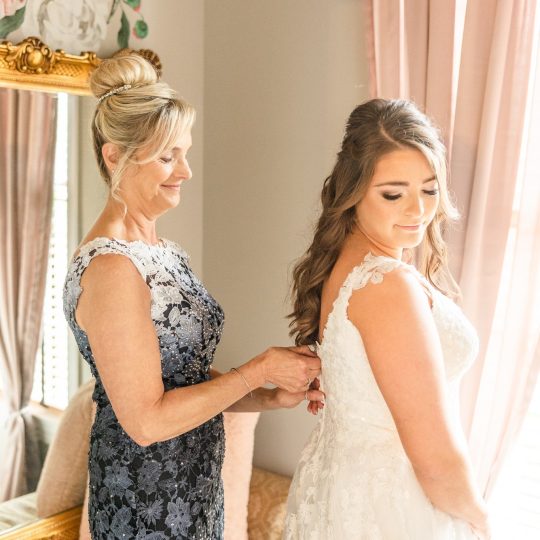 bride and mother in bridal suite bride and mother in bridal suite